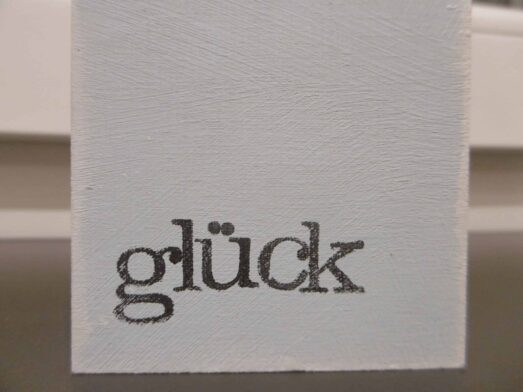 Holzschild, Wort, Glick