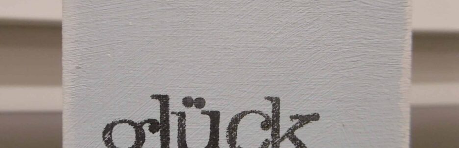 Holzschild, Wort, Glick {{brizy_dc_image_alt entityId=